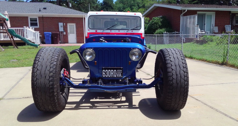 Illustration for article titled Someone's Selling a Postal Jeep Powered by Two Small-Block Chevy Motors Bolted Together